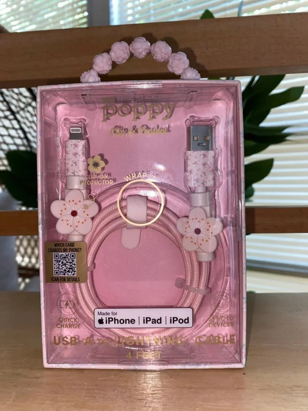 the XO Poppy Pink Flower USB-A to Lightning Cable IPhone Charger
